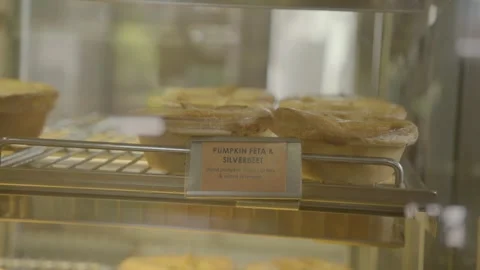 Savory Pies on Display in Glass Case at Sydney Restaurant, Australia Stock Footage 345665849