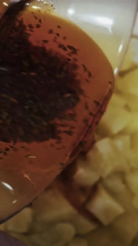 Savory Sauce Dripping Over Crispy Potatoes Stockbeeldmateriaal 289631140