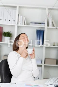 Savouring the morning coffee break Stock Photos