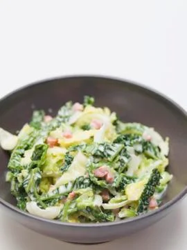 Savoy cabbage with bacon Stock Photos