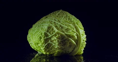 Savoy cabbage. Cut with shown inside. Roundshot circa 360 degrees. Stock Footage 221188042