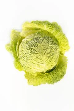Savoy cabbage on a white background isolate. Top view. Vertical photography. Stock Photos