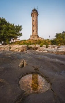 Savudrija Lighthouse on Rocky Coast Reflected in a Puddle, the Most Western P Stock Photos