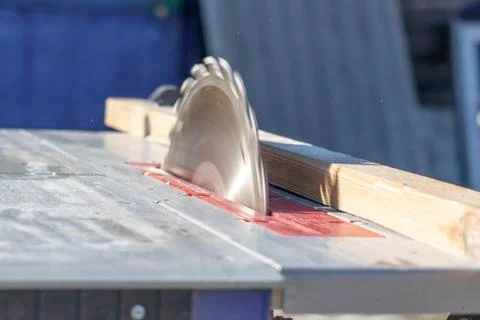 Saw blade. machine is ready to work. there is a blackboard in the background Stock Photos