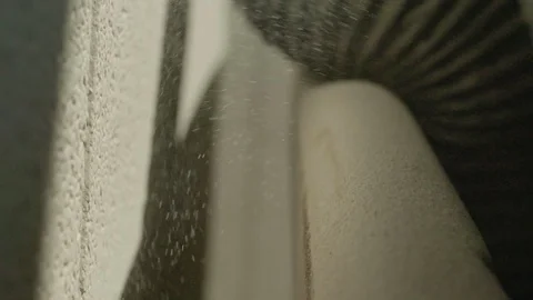 Saw-dust being propelled through the machine in slow motion Stock Footage 87613608