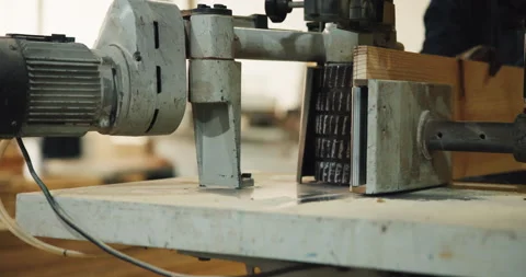 Saw, machine and hands of carpenter in workshop for carpentry, wood project and Stock Footage 341304947