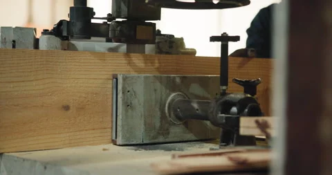 Saw, machine and hands of carpenter in warehouse for carpentry, wood project and Stock Footage 341309259