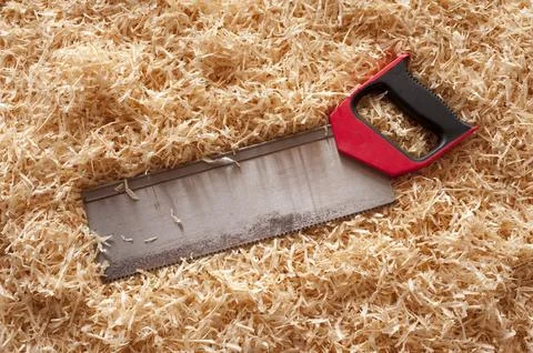 Saw with red handle Photos