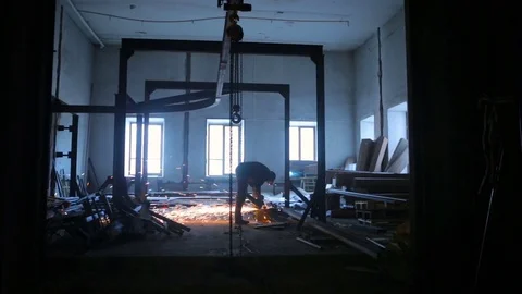 Sawing metal with a grinder Stock Footage 71100302