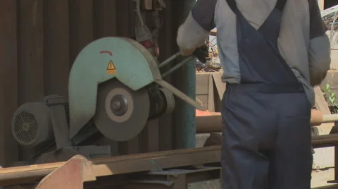 Sawing pipes Stock Footage 42379297