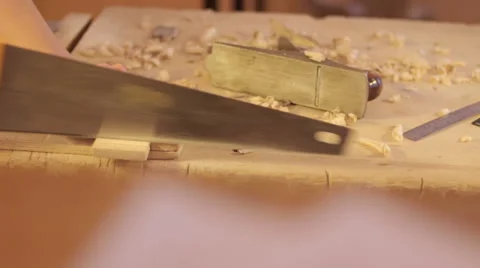 Sawing the plank with a hand saw Stock Footage 59231605