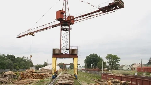 Sawmill. Crane. Logs Stockbeeldmateriaal 74579537