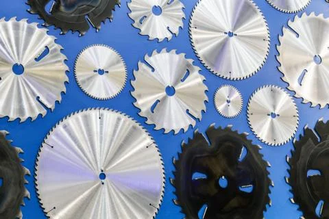 Sawmill cutting discs hang as a pattern Stock Photos