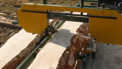 Sawmill machine, processing a log of wood  Stock Footage 120056514