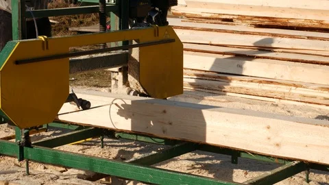 Sawmill machine, processing a log of wood  Stock Footage 120056558