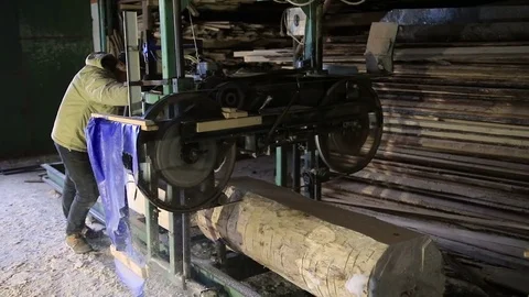 Sawmill. The process of cutting logs into boards Stock Footage 72405223