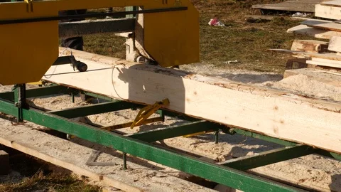 Sawmill. Process of machining logs Video stock 120057264
