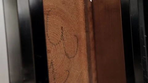 Sawmill saws slow-motion processing of wooden beams Stock Footage 157291222