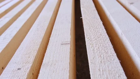 Sawn boards lie on the floor parallel to each other for drying. Preparation f Video stock 181612694
