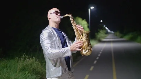 Sax man in the night Stock Footage 94044200