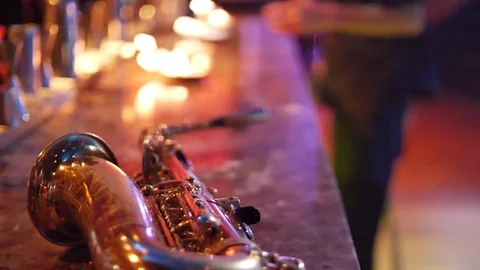 Saxophone and fire on the bar Stock Footage 84011839