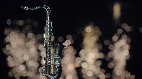 Saxophone and light reflection in water Stock Footage 95437323
