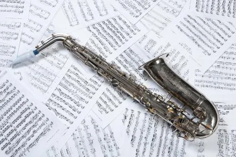 Saxophone And Notes Stock Photos