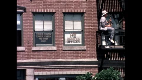 Saxophone on balcony Stock Footage 276290370