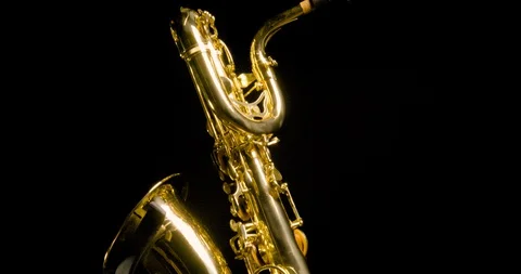 Saxophone on black background Stock Footage 129331975
