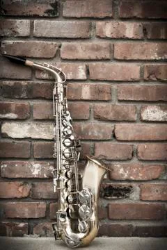 Saxophone Brick Wall Foto stock