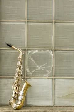 Saxophone Brick Wall Foto stock