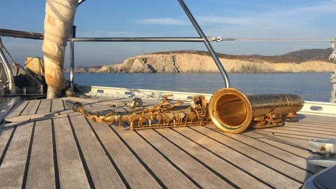 Saxophone on the deck of a yacht Stock Footage 86562010