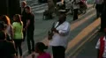 Saxophone player busking on the streets of New York HD Footage
