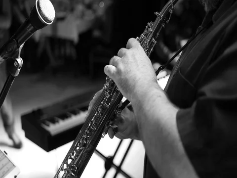 Saxophone Player Doing Solo During Performance Black/White Video stock 78596031