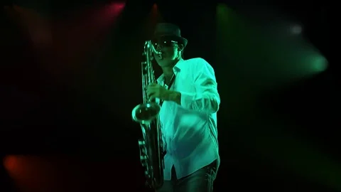 SAXOPHONE PLAYER IN PERFORMANCE ON THE STAGE Video stock 74764274