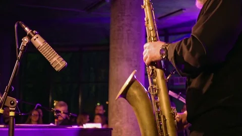 Saxophone player on the stage Stock Footage 73392736