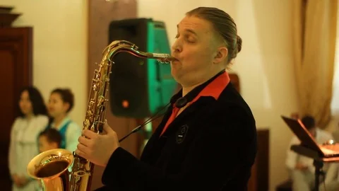 Saxophone player at work Stock Footage 82297856