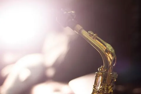 Saxophone with volume light background Stock Photos
