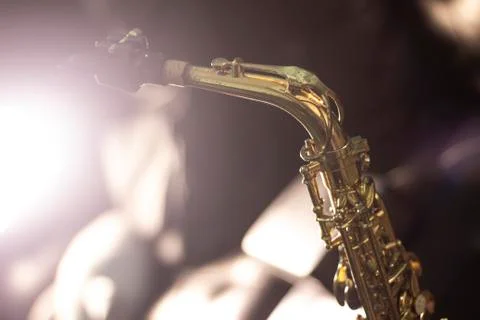 Saxophone with volume light background Stock Photos