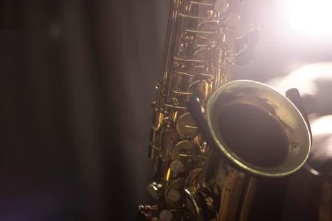 Saxophone with volume light background Stock Photos
