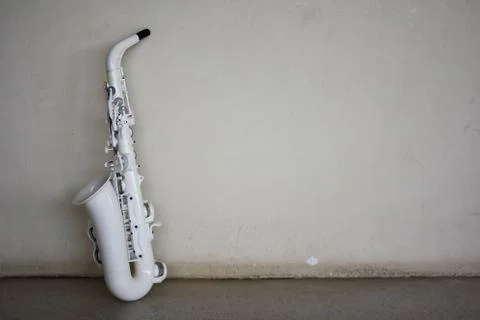 Saxophone on a white background Stock Photos