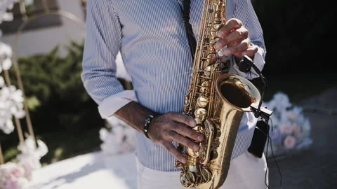 Saxophonist playing close-up at a wedding Stock Footage 240705249