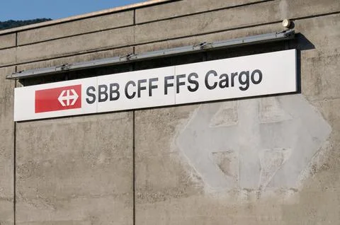 SBB CFF FFS Cargo official railway company sign on concrete building wall i.. Stock Photos