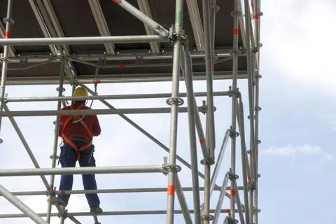 Scaffold and worker Stock Photos