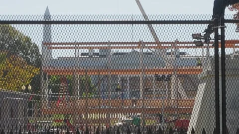 Scaffolding and cranes behind the White House security fence Stock Footage 345299564