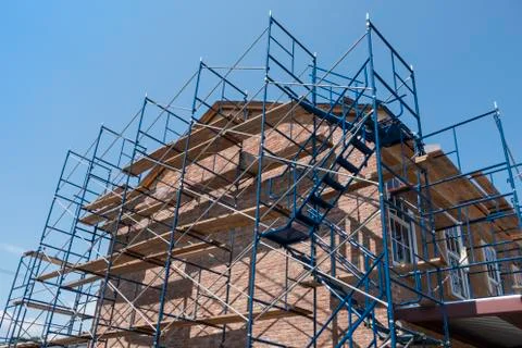 Scaffolding on brick building Stock Photos