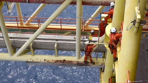 Scaffolding erection. Working at height and overboard. Video stock 129526576