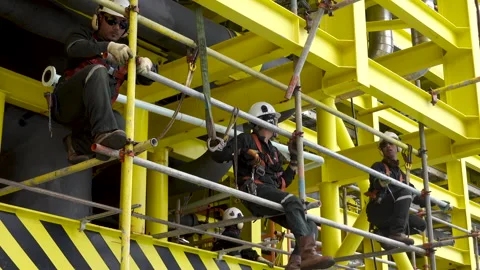 Scaffolding erection. Working at height and overboard. Video stock 158145902