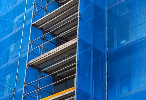Scaffolding on the facade of a skyscraper Stock Photos