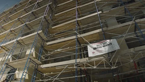 Scaffolding in front of a building Stock Footage 155538806